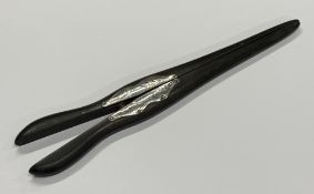 A pair of silver mounted glove stretchers.