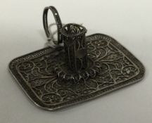 A 19th Century filigree silver toy chamberstick.