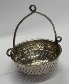 A French silver tea infuser.