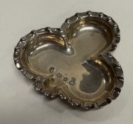 A silver ashtray.