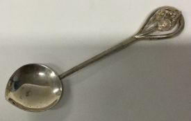 An Arts & Crafts Australian silver feeding spoon.