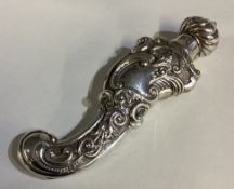 A large Victorian silver scent bottle.