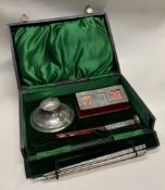 A rare silver gentleman's stamp and writing set.