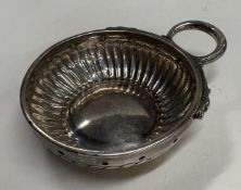 An 18th Century French silver wine taster.