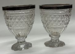 A pair of George III silver and glass bowls.
