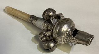 A bright-cut silver teether with bells.