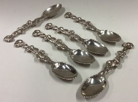 A set of six Victorian cast silver 'Harlequin' spoons.