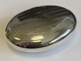 A good engine turned silver tobacco pouch.
