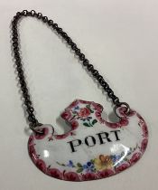 An enamelled wine label for 'Port'.