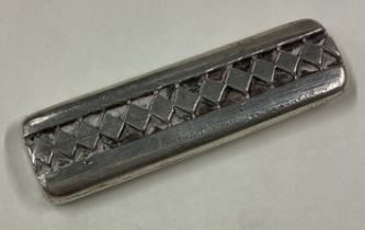 PATRICK MAVROS: A silver ingot.