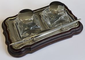 A silver-mounted ink stand.
