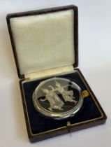 A cased Oriental silver compact.