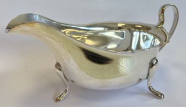 An Edwardian silver sauce boat.