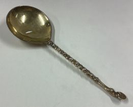 An Antique silver gilt spoon with hoof finial.