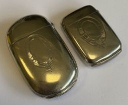 Two EPNS vesta cases.