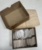 A box containing a collection of Roman and other coins.