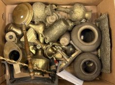 A box containing brass candlesticks, goblets etc.