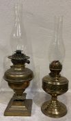 Two old brass oil lamps.
