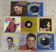 ELVIS PRESLEY: (American, 1935 - 1977): Eight 7 inch vinyl record singles (reissues).