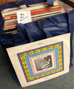 A selection of 12 inch vinyl record albums.