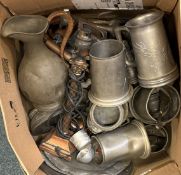 A large collection of pewterware.