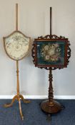 Two Victorian pole screens.