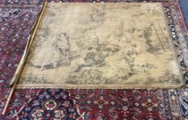 A large roll of tapestry.