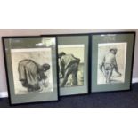 A trio of framed and glazed charcoal and chalk drawings.