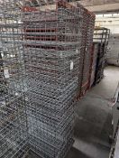 +VAT Stack of 19 46x77cm metal wire stacking trays on a metal 4 wheel dolly.