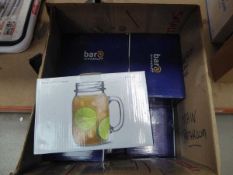 Box containing Mason drinking jar glasses