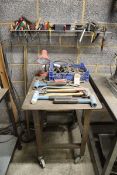 +VAT A range of various hand tools on a small bench and wall rack