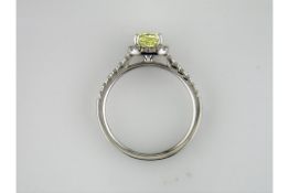 A New Cushion Cut Intense Yellow Certified Diamond Halo Ring