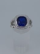 Silver Stamped 925 Dress Ring Set With CZ Stone, Centres Tone Measures 5.94 mm Diameter.