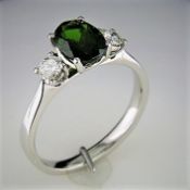 An New Oval Diopside With Diamonds