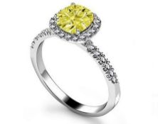 A New Cushion Cut Yellow Diamond Halo Ring