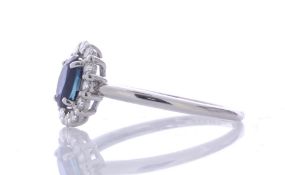 Platinum Single Stone With Halo Setting and Sapphire Ring (S0.69) 0.20 Carats