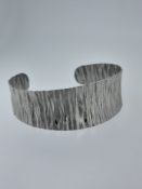 Silver Cuff Bangle Contemporary Curved Ribbed Detail