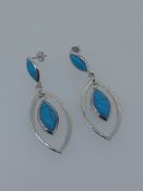 Silver drop earrings set with reconstituted turquoise stones