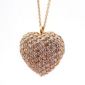 An Exquisite Heart Necklace Detailed With Brilliant Diamonds