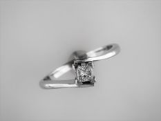 A New 0.25 carat Princess Cut Crossover Ring