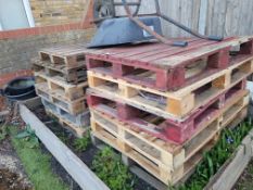 Approximately 10 Mainly Commercial Pallets Made of Very Hard Wood.