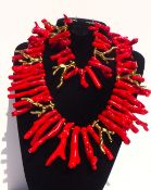 A Very Glamorous and Unusual Red Coral Necklace and Bracelet Set