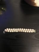 Faux Pearl Bracelet With Twisted Gold Tone Metal