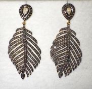 An Antique Pair of Silver & Gold Earrings With Old Cut Natural Diamonds.