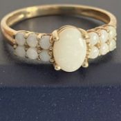 9 Carat Gold and Opal Ring Having White Fire Opal To Centre With White Opal Shoulders. 1.7 Grams.