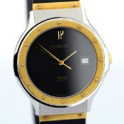 Hublot / MDM Depose 36mm 256063 18K Gold Stainless Steel Black Dial Date Quartz Wristwatch