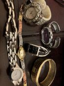 6 Watches and A Bracelet