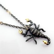 An Exquisite Scorpion Necklace Detailed With Brilliant Diamonds and Gold On Silver.