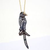 An Exquisite Bird Necklace Detailed With Brilliant Diamonds and Gold On Silver