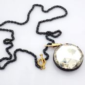 An Exquisite Necklace Detailed With White Topaz and Gold In Silver